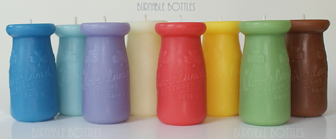 A group of CLOVERLAND FARMS DAIRY 1/4 pint milk bottle candles --- Burnable Bottles - AntiqueBottleHunter.com