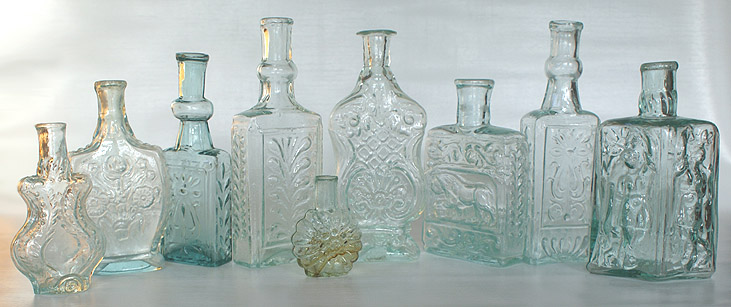 A group picture of early colognes. --- AntiqueBottleHunter.com