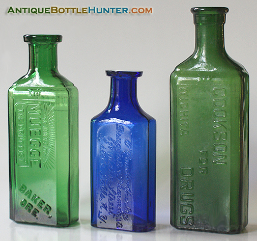 A yellow green MUEGEE, a rich blue O'ROURKE & HURLEY and a yellow green COOKSON FOR DRUGS. --- Antiquebottlehunter.com