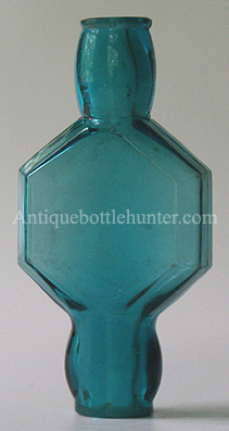 A teal blue/green smelling bottle with a hexagon shaped center and openings at both ends. Each lip has been ground and smoothed. Length, 2 - 7/8 in. Width, 1 - 3/8 in. --- AntiqueBottleHunter.com