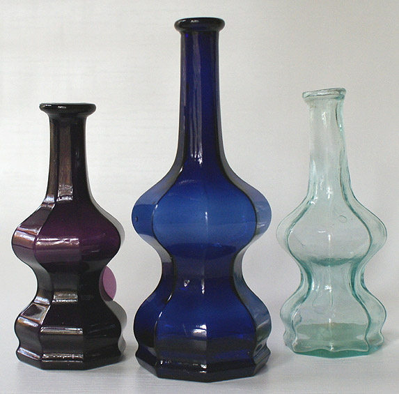 Three 'hourglass' or polygonal colognes. --- AntiqueBottleHunter.com