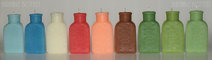 A group of KT-4 triangular poison bottle candles --- Burnable Bottles - AntiqueBottleHunter.com