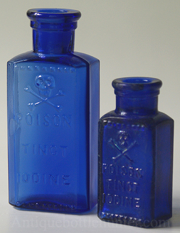 Both sizes of the blue KR-3s with nice skull and crossbones. --- AntiqueBottleHunter.com 